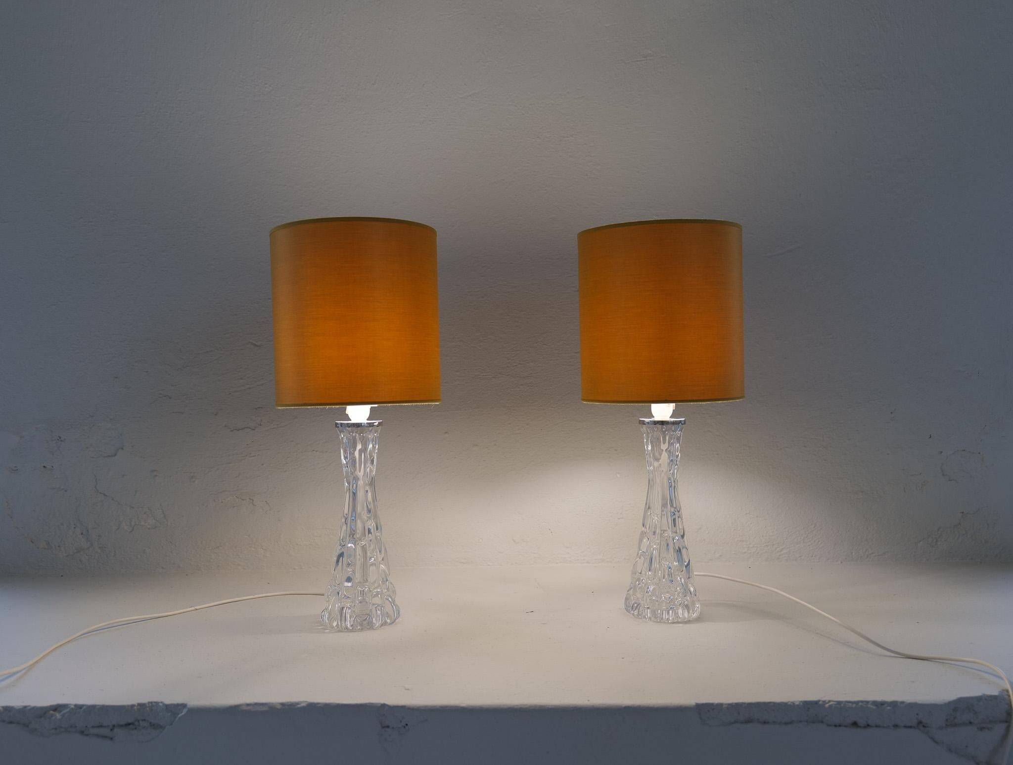 Mid-century modern crystal table lamps by Orrefors, designed by Carl Fagerlund, Sweden, 1970s.