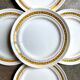 5 St Amand flat plates in yellow and gold earthenware