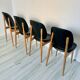 Lot de 4 chaises vintage "Pégase" – design Baumann, bois clair & skaï