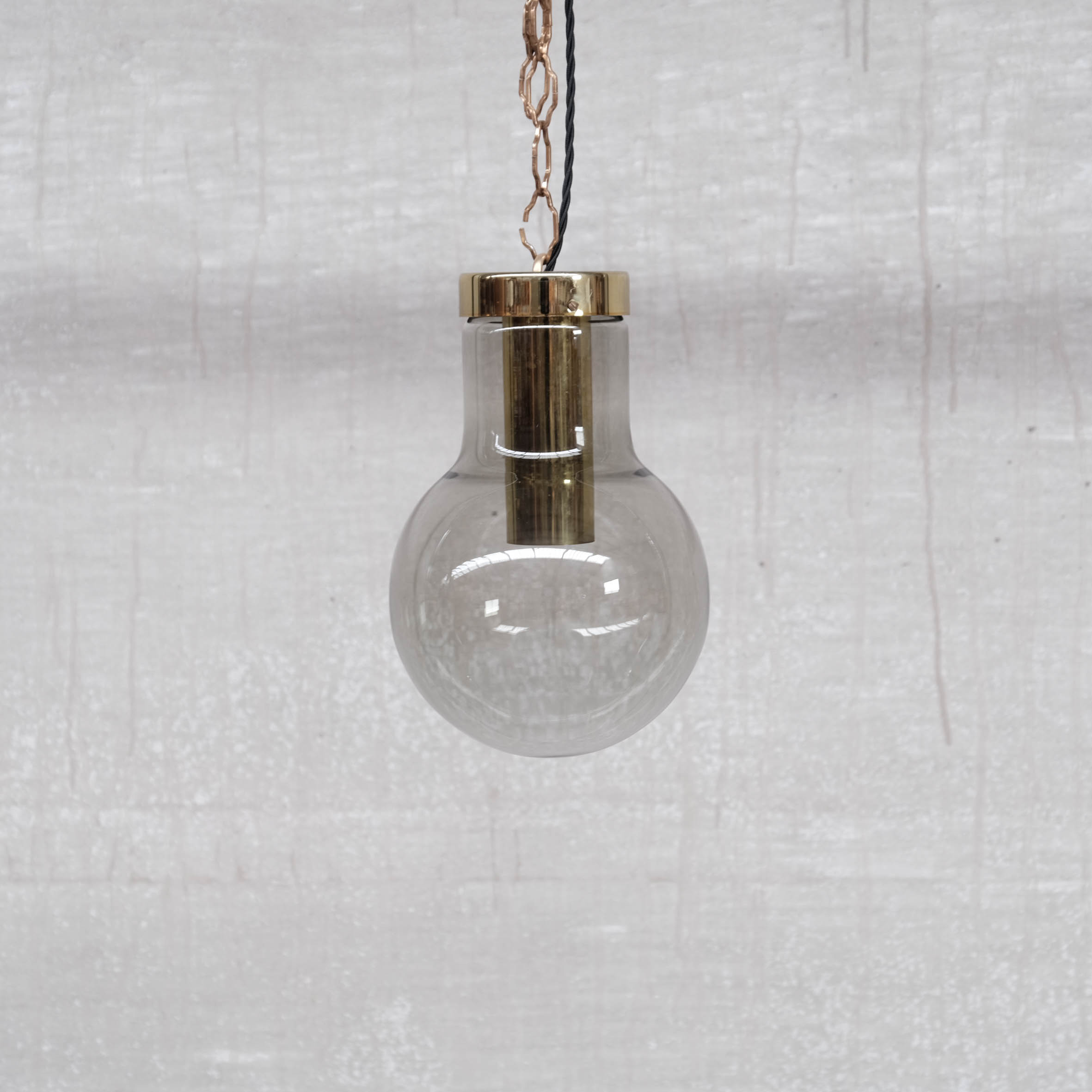 Smoked mid-century glass and brass pendant light by raak