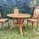 Canned rattan dining table and vintage glass