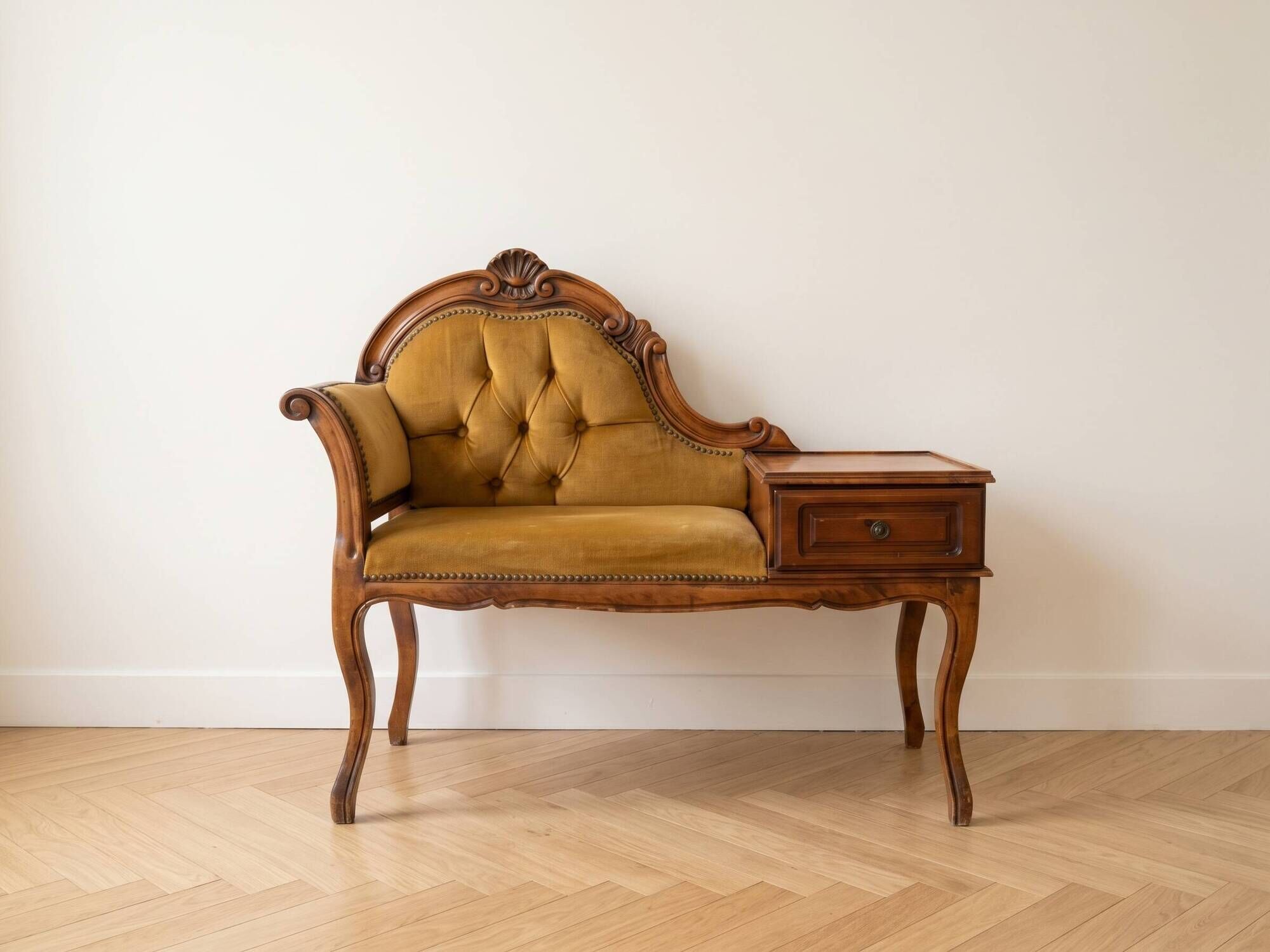 Vintage telephone bench in Louis XV style made of wood and yellow fabric.