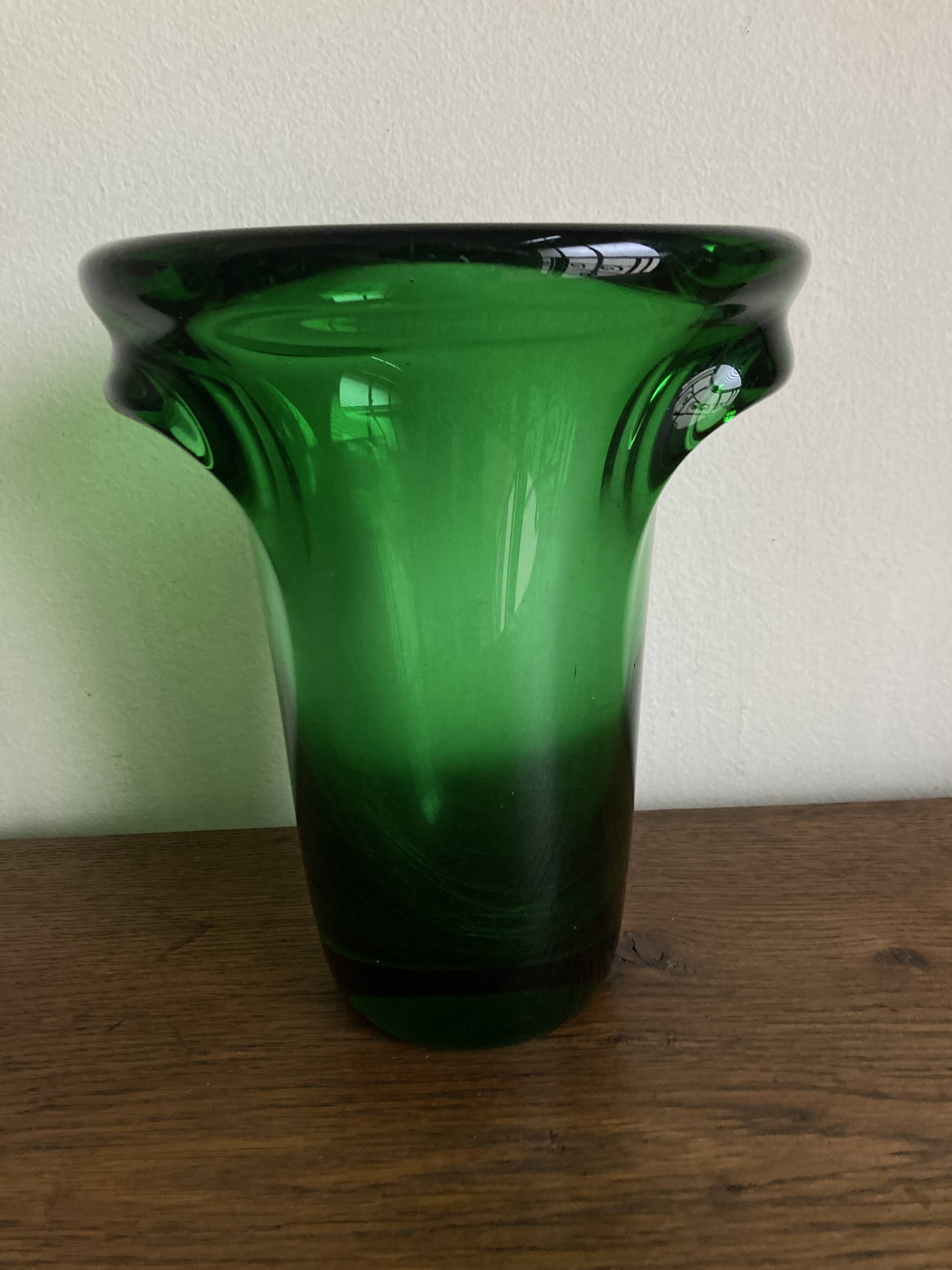 1950s Médicis vase, large Art Deco with handles, made of green blown glass.