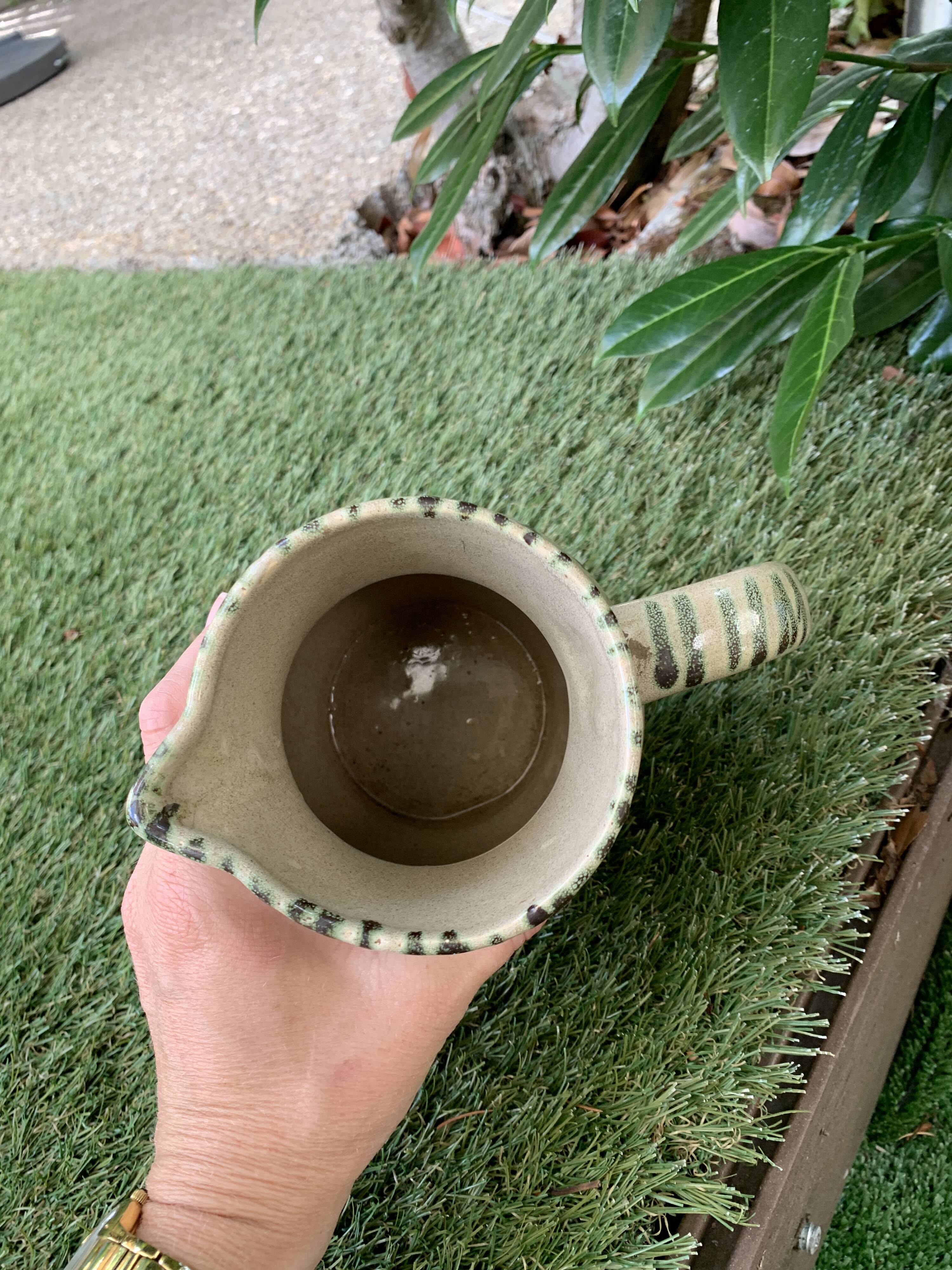 Vintage ceramic pitcher model flowers