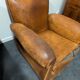 Pair of moustache club armchairs in leather, France, 1930s — to be restored.