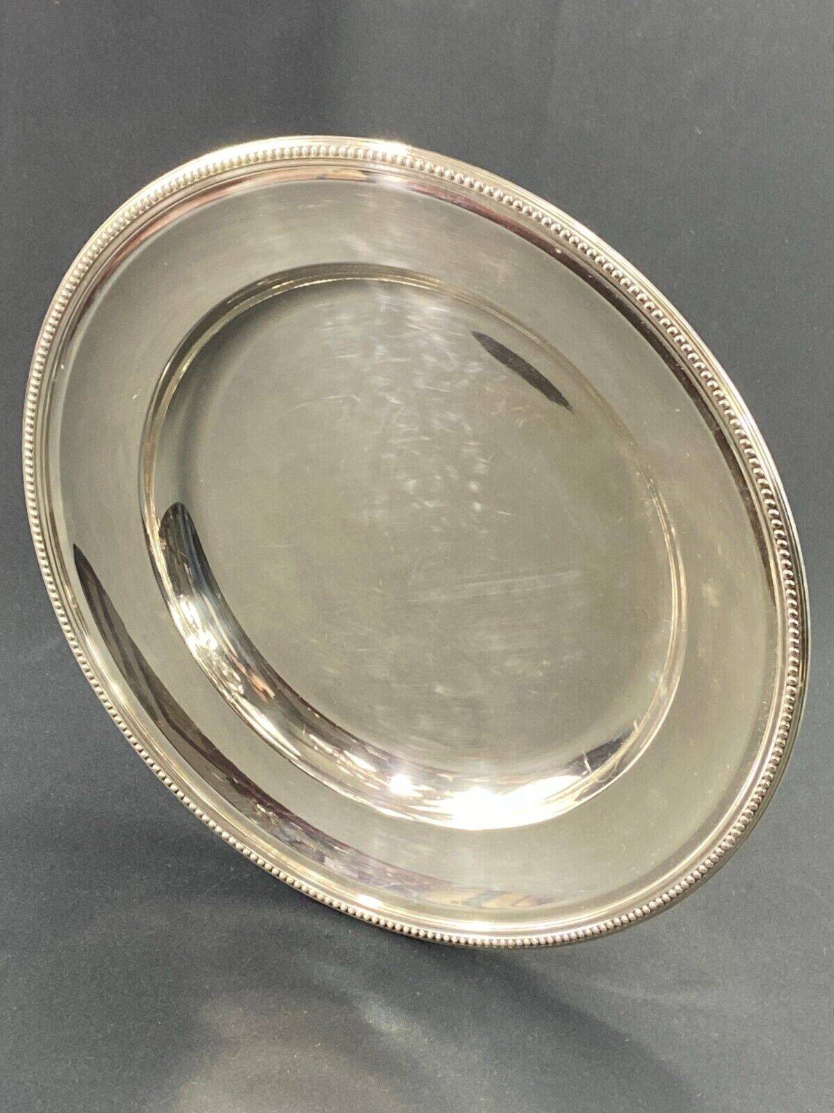 Circular silver metal dish signed Christofle pearl model