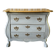 Curved patinated chest of drawers