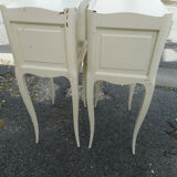 Pair of white lacquered bedside tables