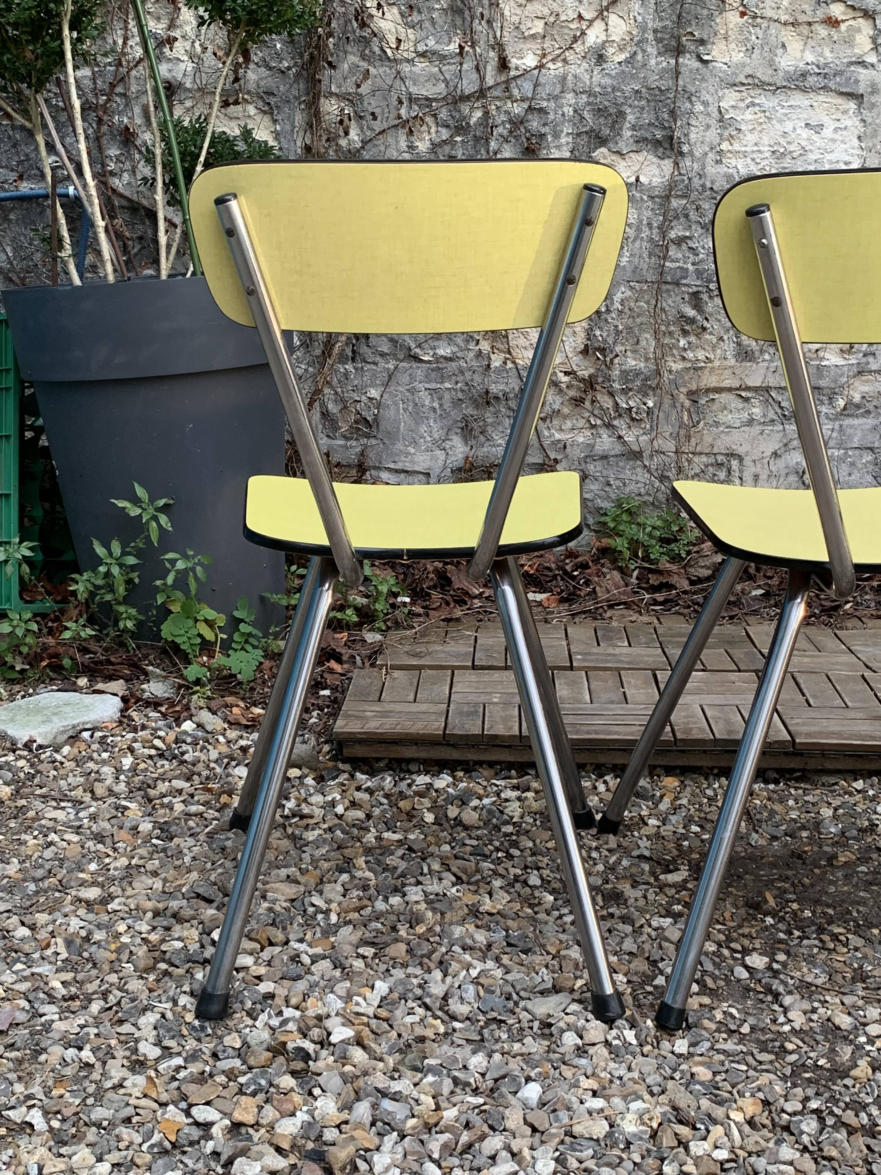 Yellow Formica chairs with compass legs, 1950s