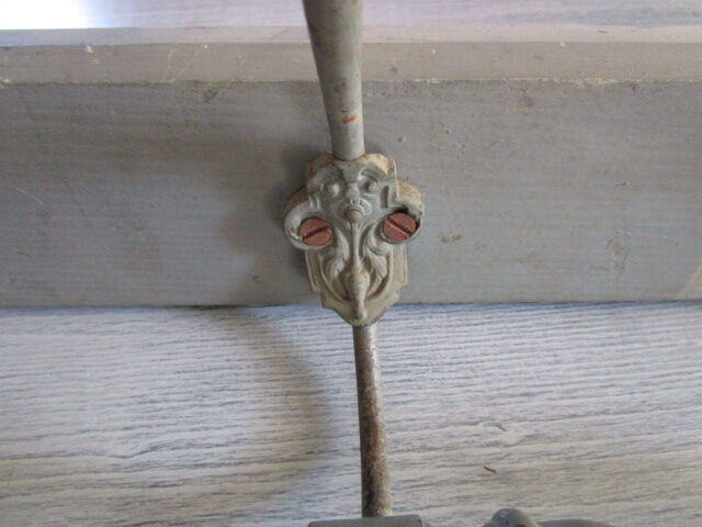 Old coat hangers in wood and metal