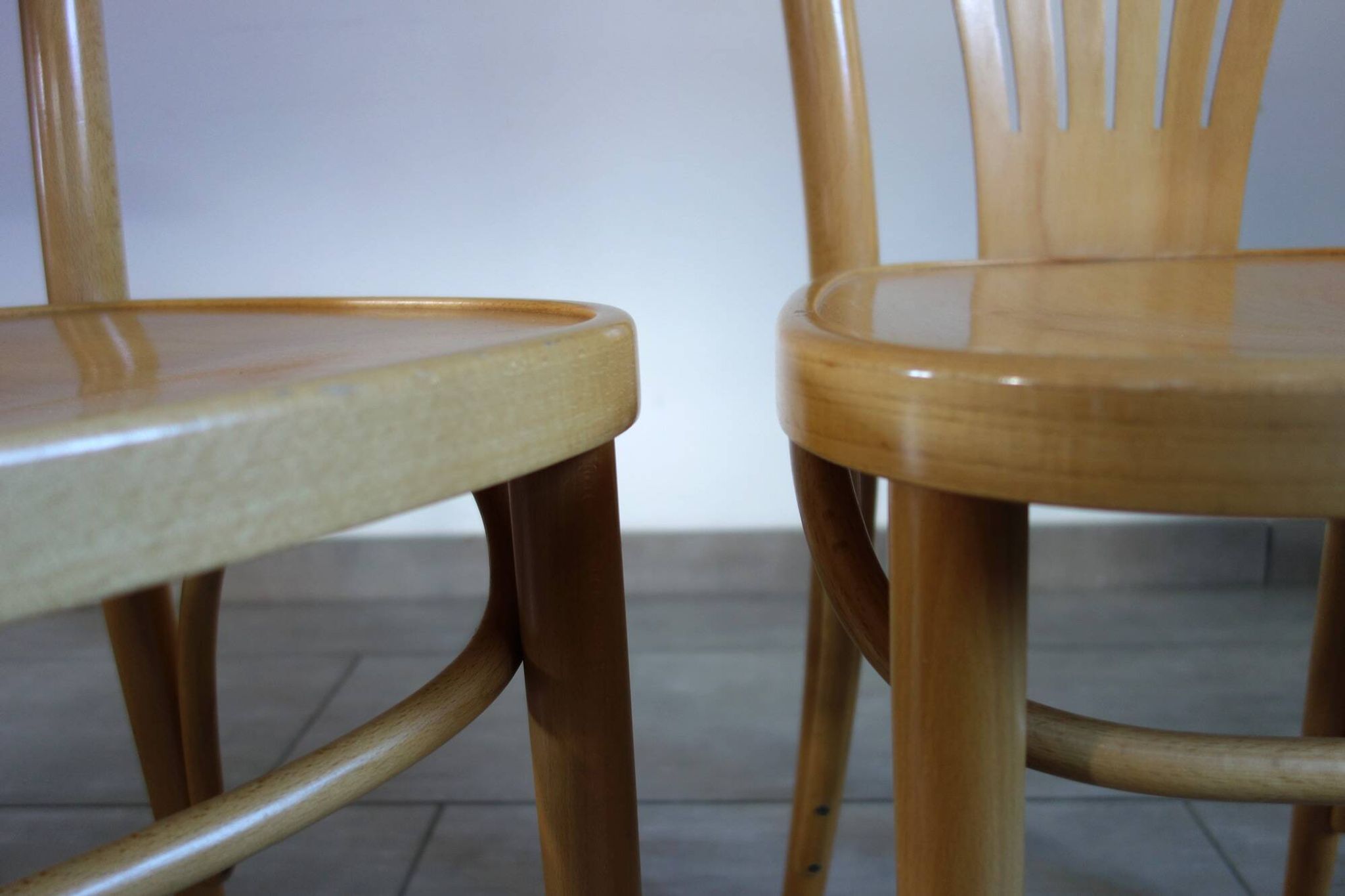 Pair of Thonet-inspired bistro chairs in light beech