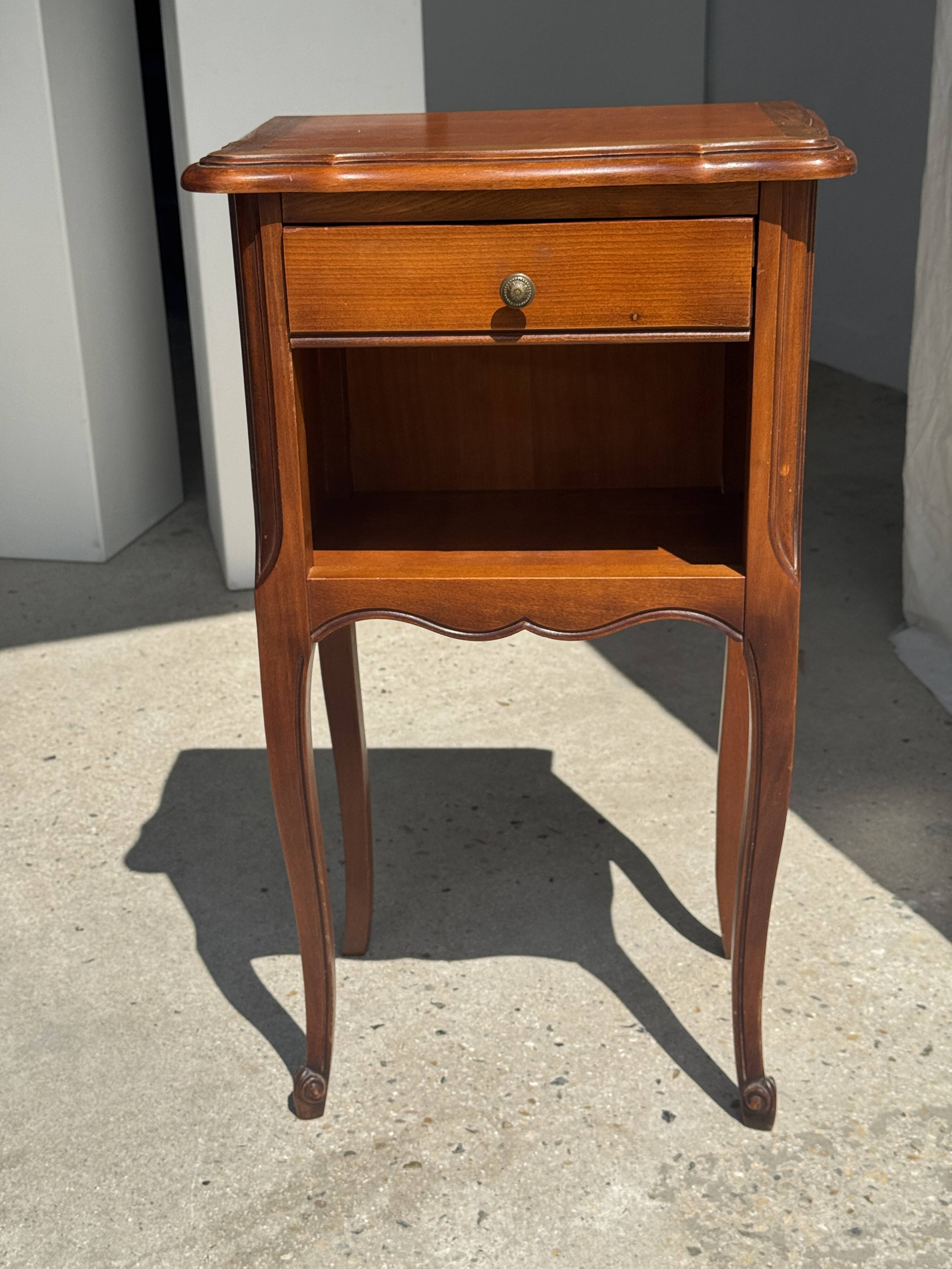 Classic wooden bedside table with drawer