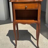 Classic wooden bedside table with drawer