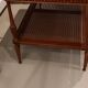 Coffee table / side table in mahogany with a rattan shelf.