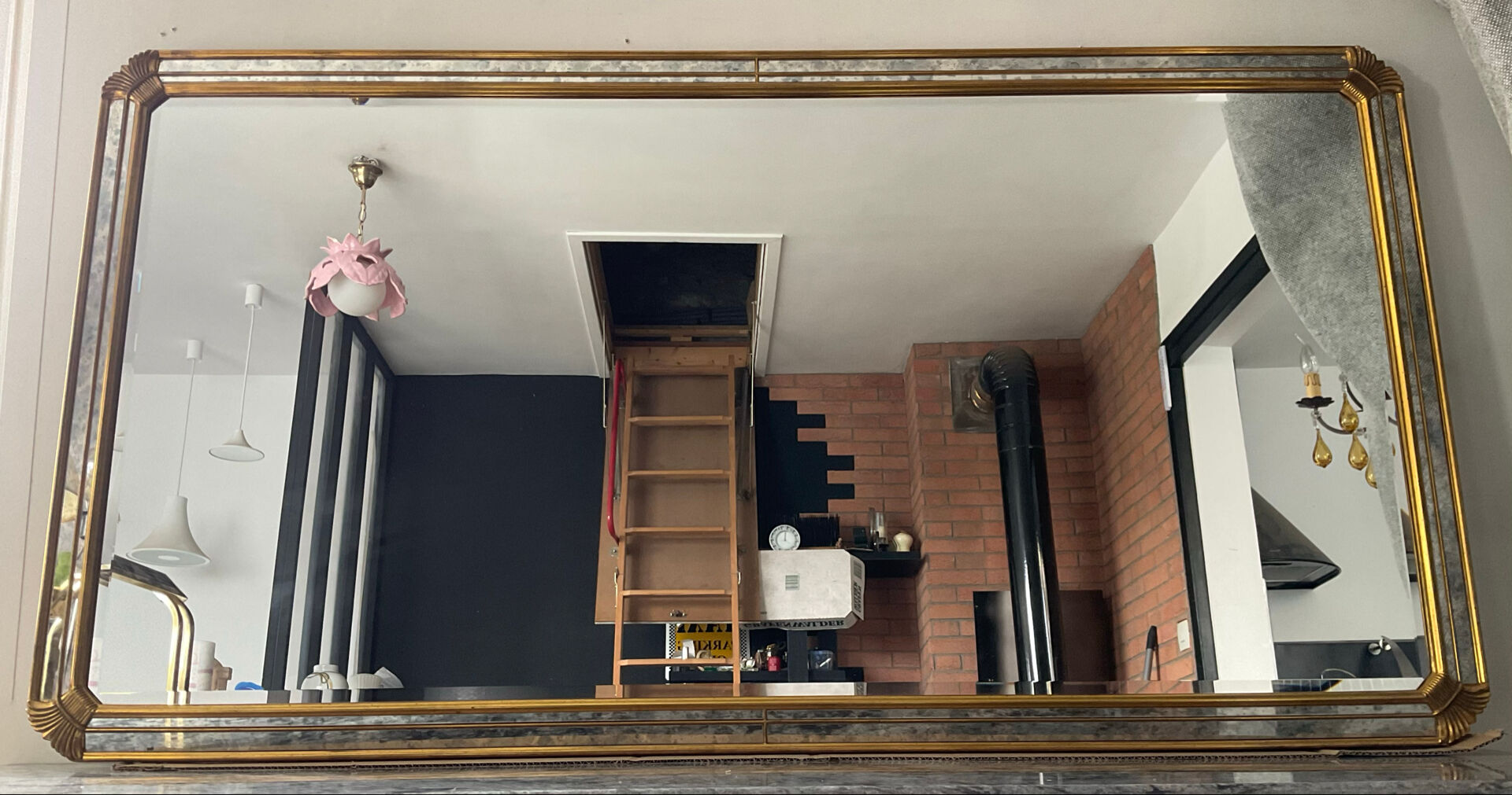 Large gold mirror by Deknudt with parcloses from the 1970s.