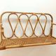 Vintage rattan shelf from the 1970s