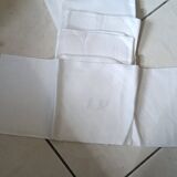 8 Damask napkins. Hand embroidered initials. LR.