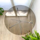 Round tripod table in smoked glass Roche Bobois 70