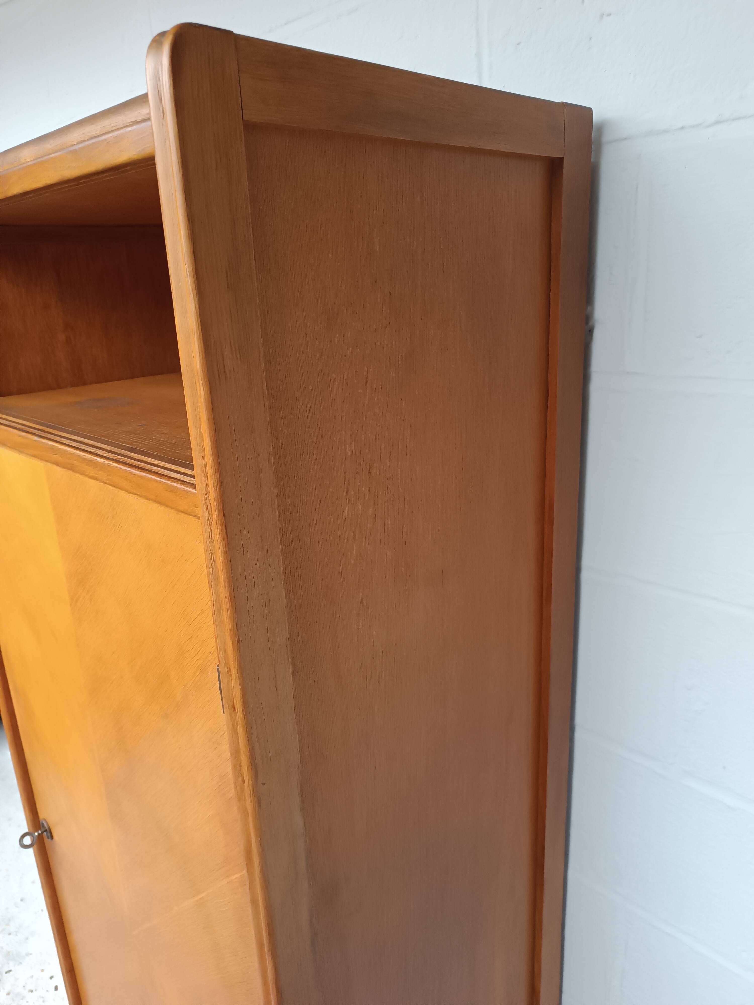 Wing-shaped locker cabinet from the 1950s