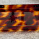Vintage plateau in tortoiseshell lucite, Maison Mercier style.