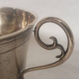 cups and saucers in solid silver