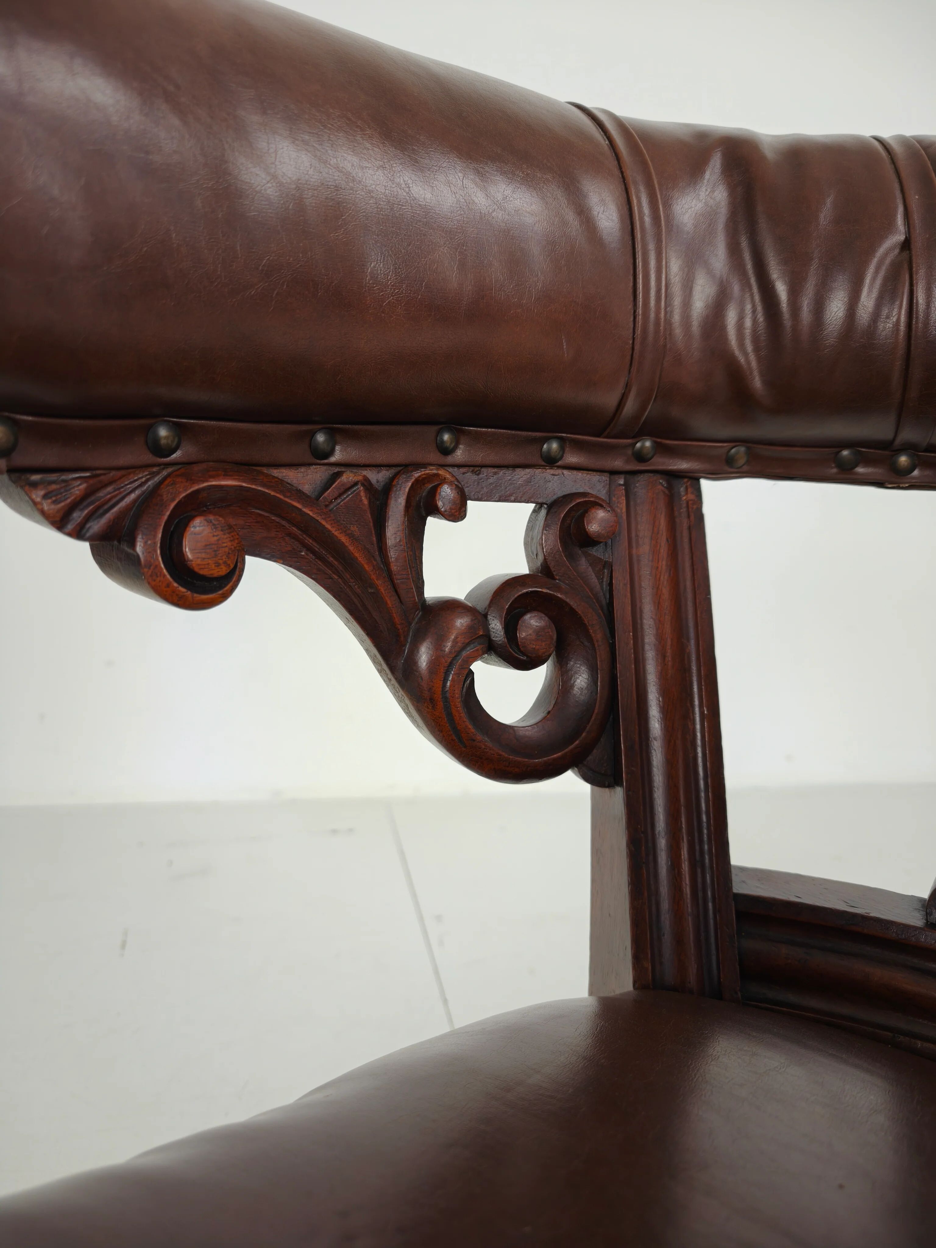 Antique leather armchair by Robson & Son – carved wood & castors, Newcastle