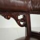 Antique leather armchair by Robson & Son – carved wood & castors, Newcastle