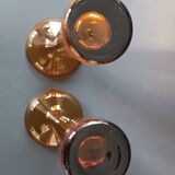 Two vintage Scandinavian double-layered amber blown glass candlesticks