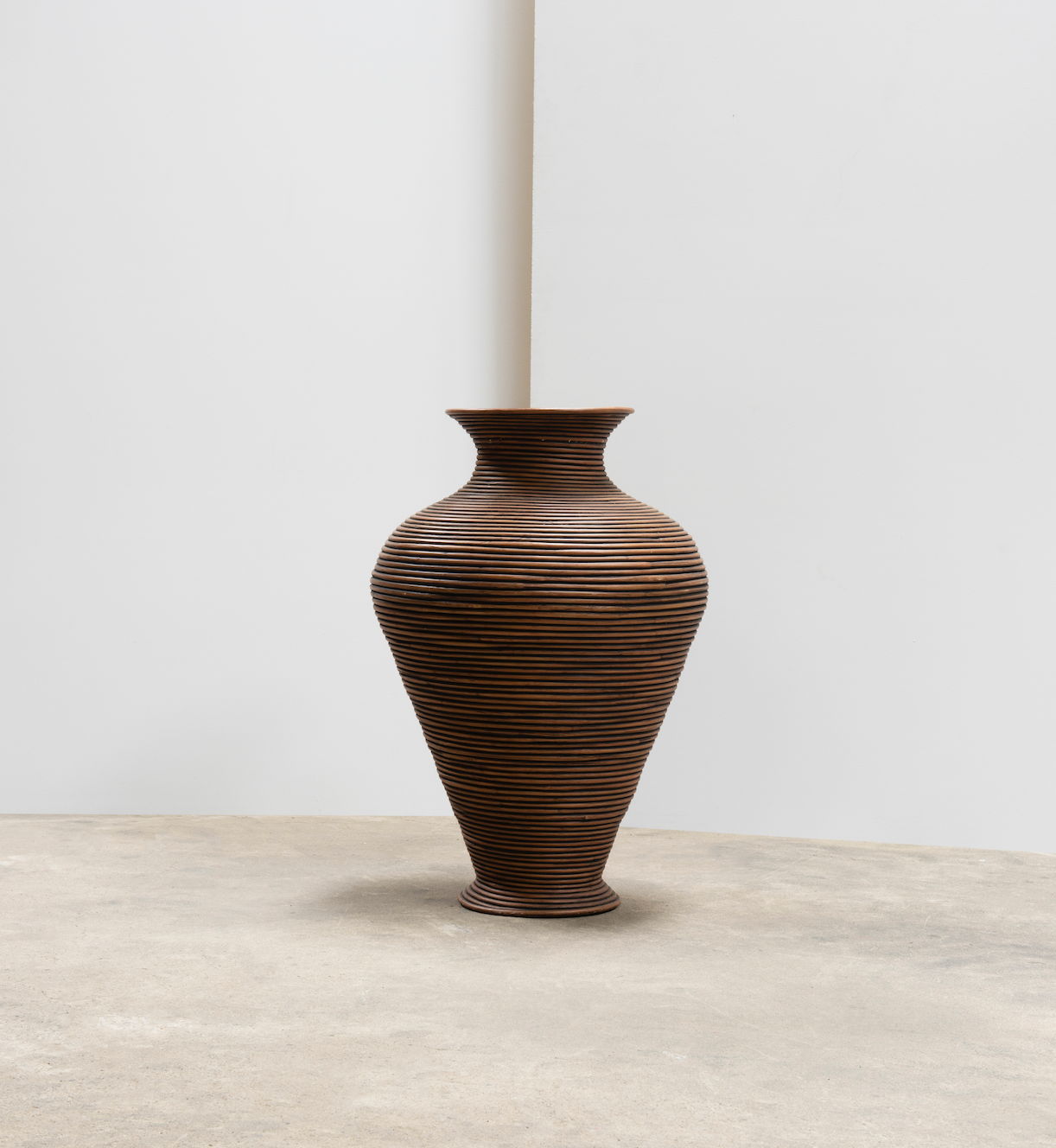 Curved rattan floor vase, Italy 1970.