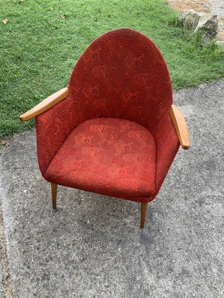 Red fabric armchair in Mid-Century Scandinavian style, high back and light wood legs (1960s)