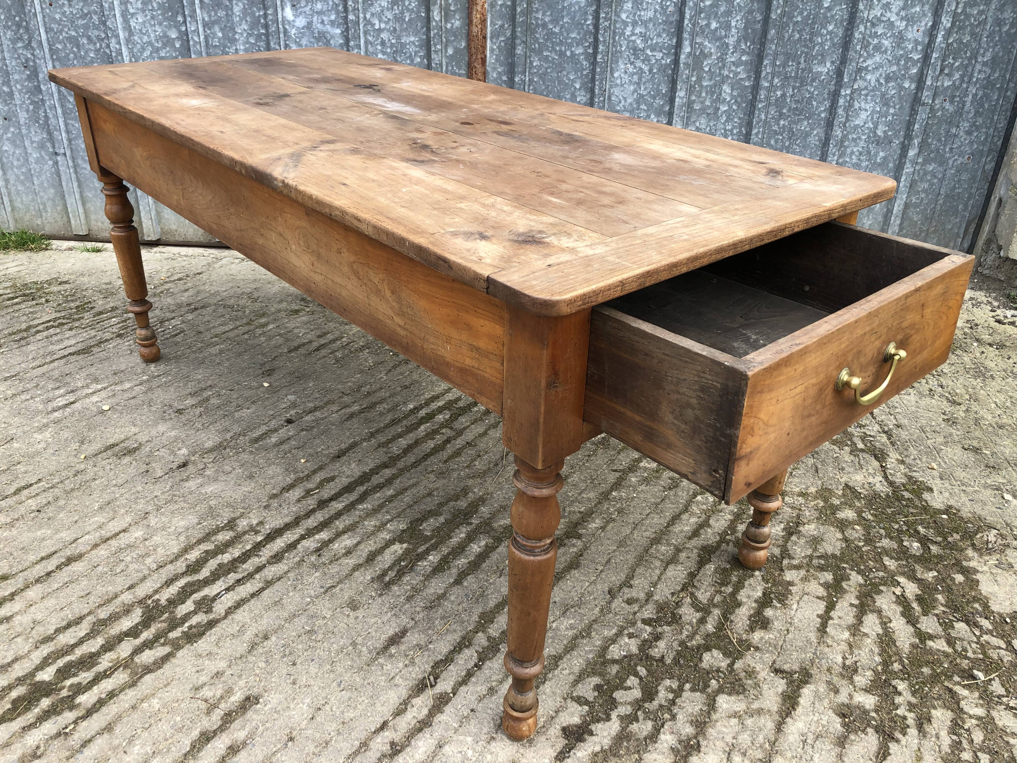 Antique cherry farmhouse table with 2 drawers and 1 pull-out