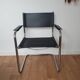 Pair of armchairs in chrome and black leather