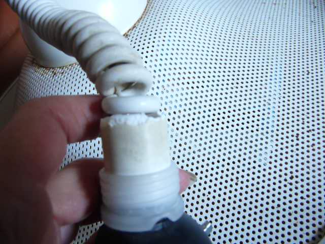 White perforated sheet metal chandelier