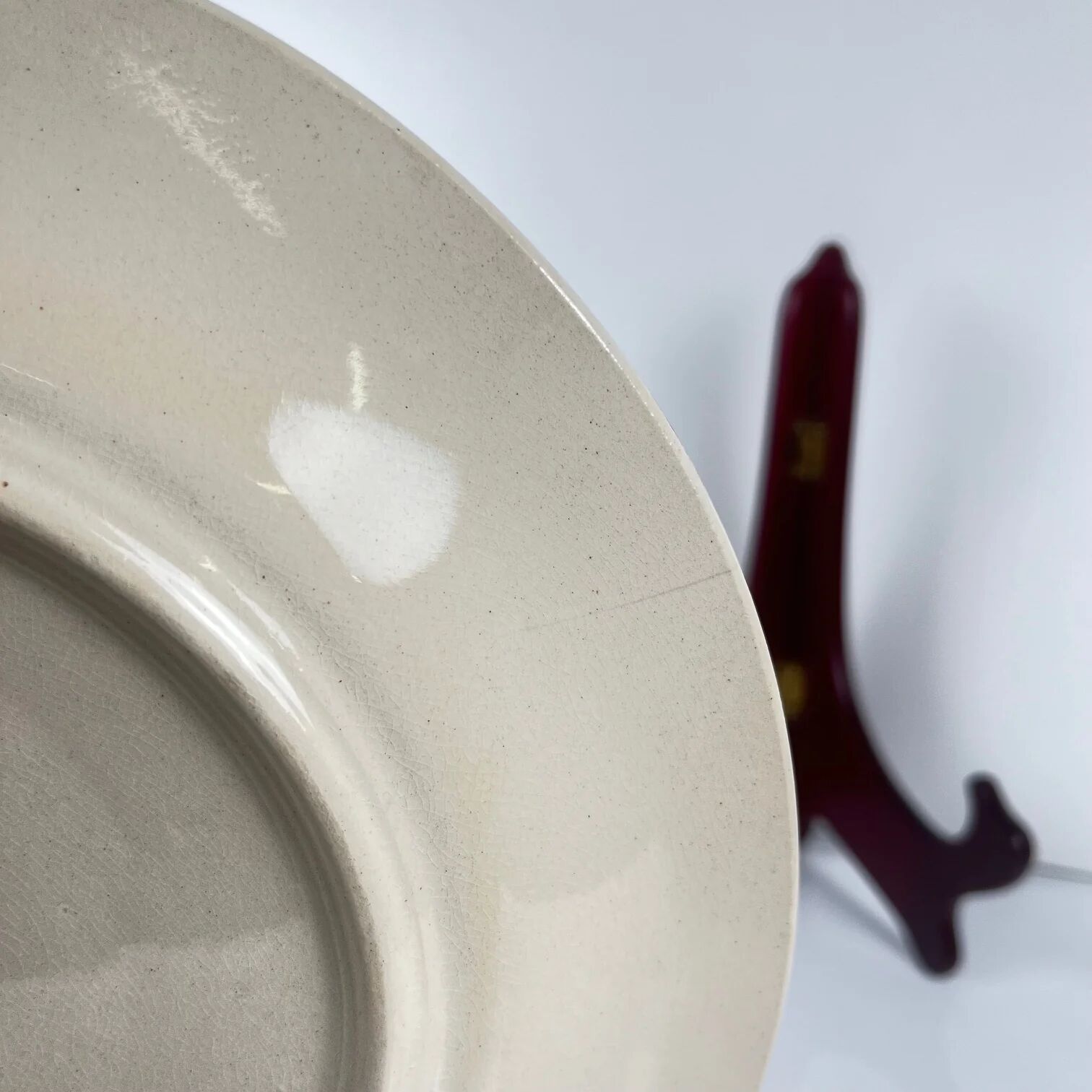 Set of 10 flat plates Longwy, 20th century, floral decoration.