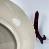 Set of 10 flat plates Longwy, 20th century, floral decoration.