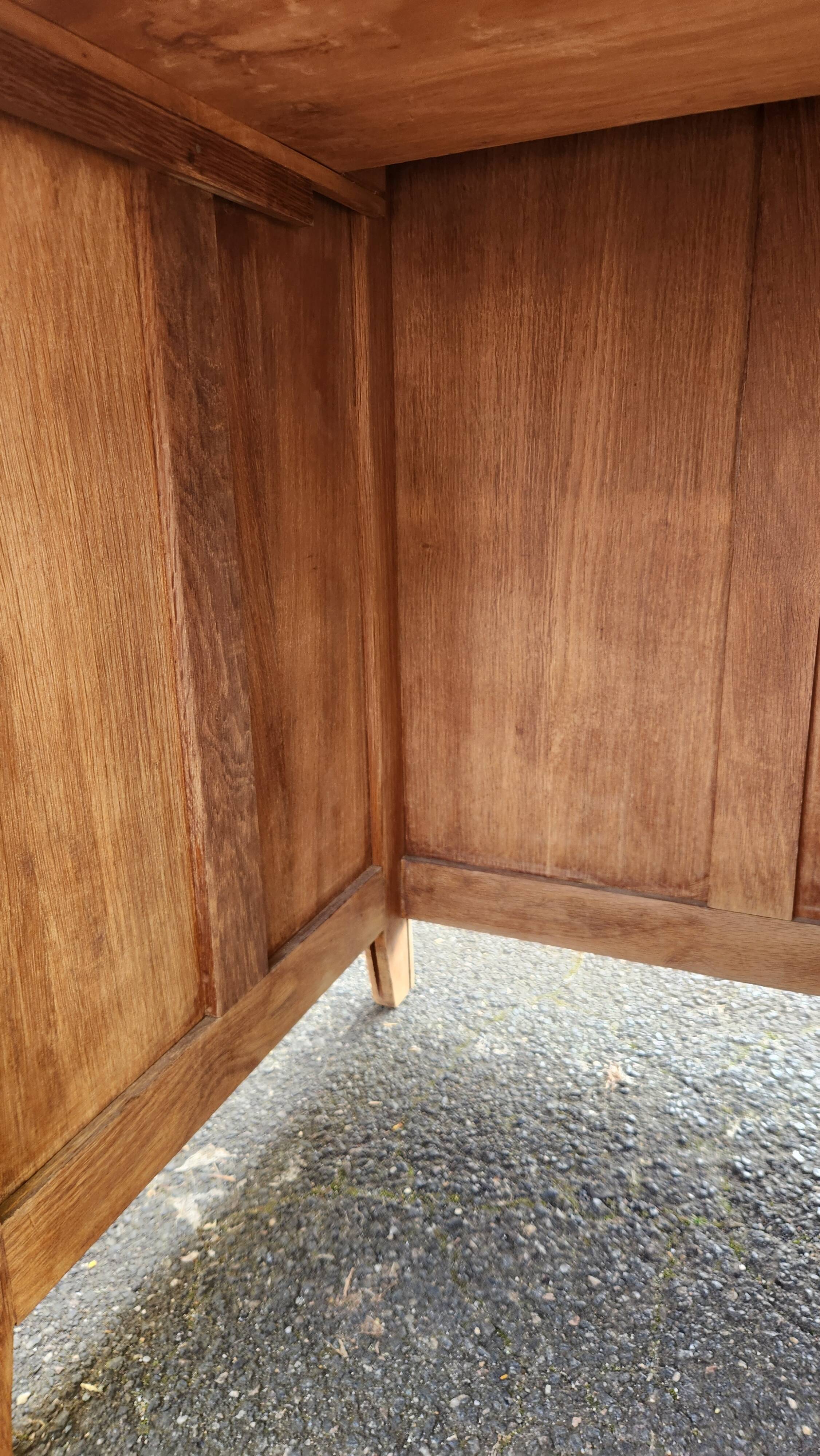 Vintage wooden desk with five drawers from the 1950s-1970s.