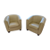 A pair of genuine leather club armchairs.