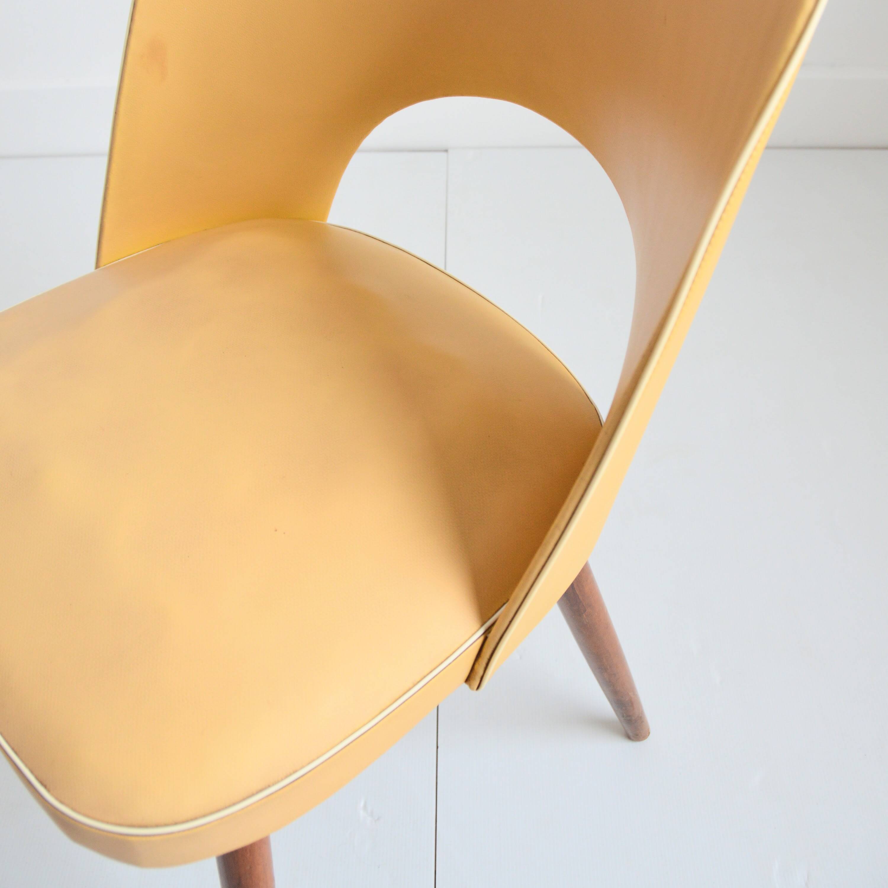 Pair of vintage 1950s cocktail chairs from Germany.