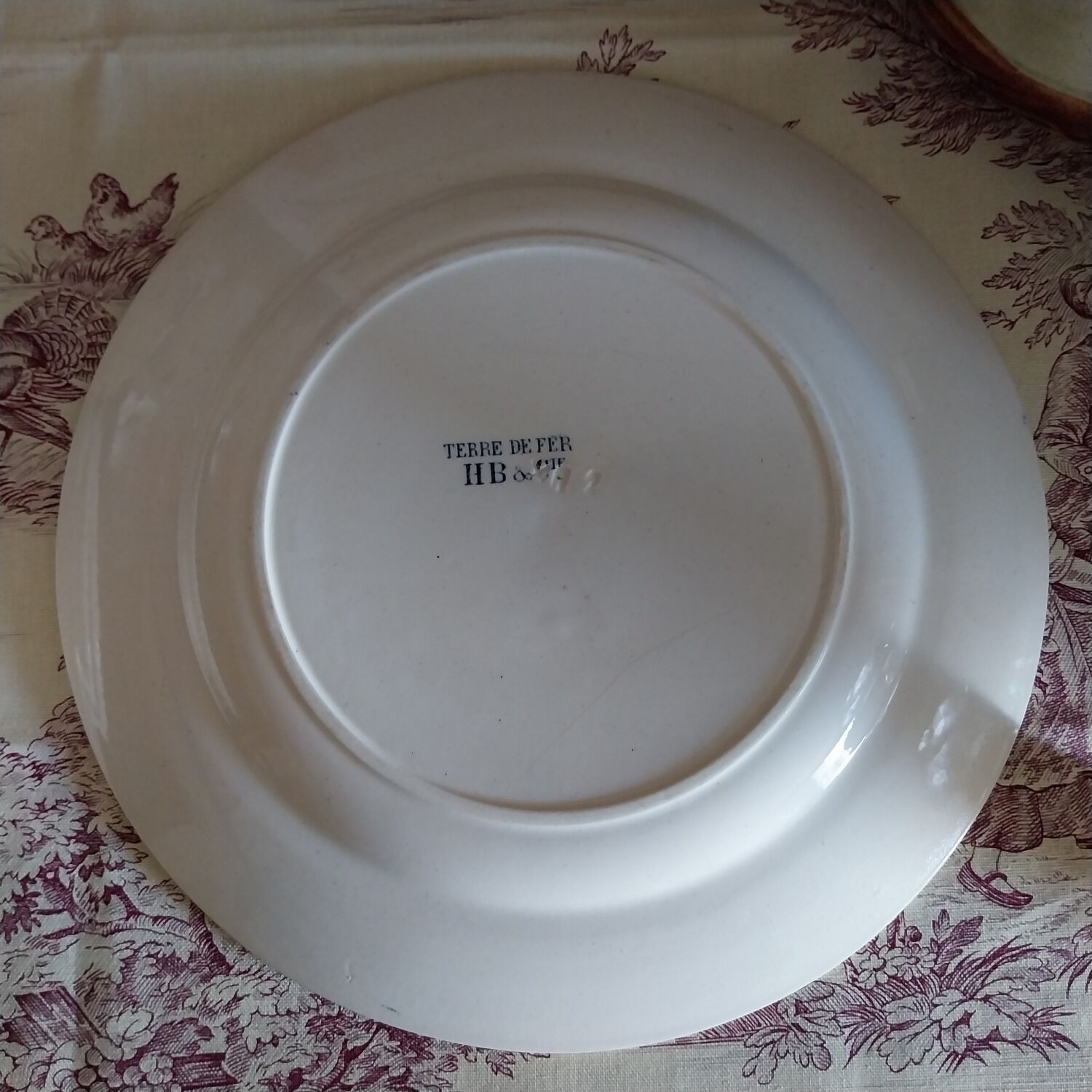 Old flat plates made of ironstone