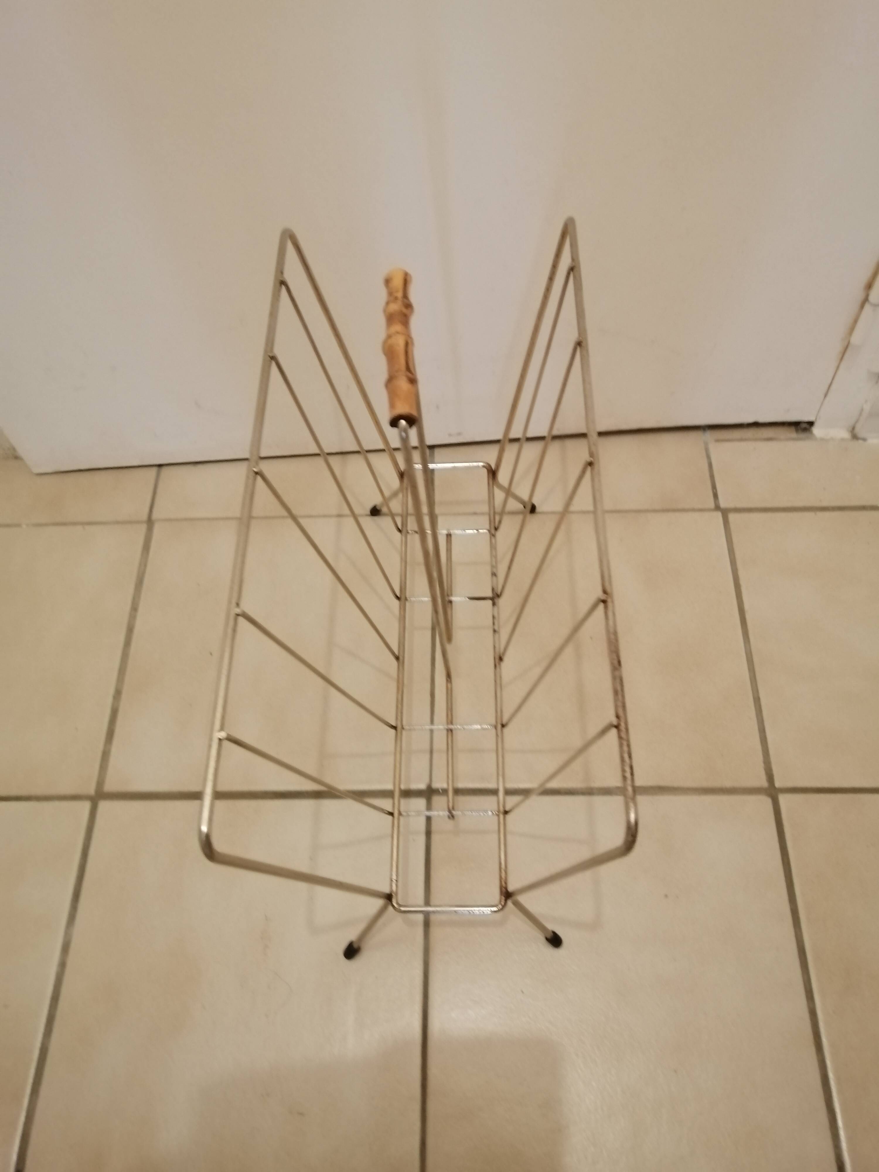 Vintage magazine holder in gold metal