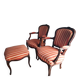 Pair of antique Louis XV style armchairs and ottoman.
