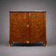 Wooden cabinet with doors, richly inlaid with floral patterns, Louis XV style.