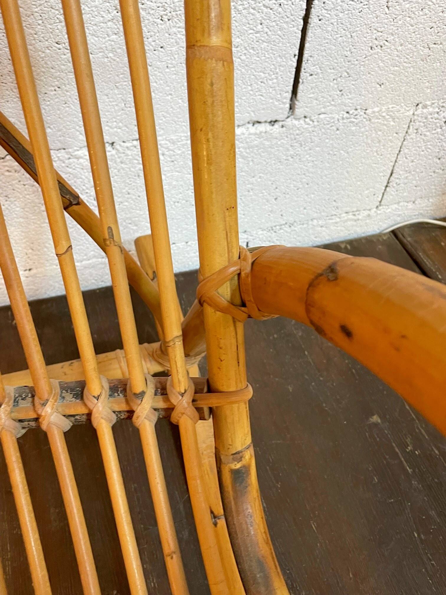 Vintage rocking chair in rattan by Rohé (Holland) from the 1960s.