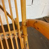 Vintage rocking chair in rattan by Rohé (Holland) from the 1960s.