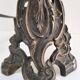 Pair of bronze andirons with black patina, 19th century, female caryatids