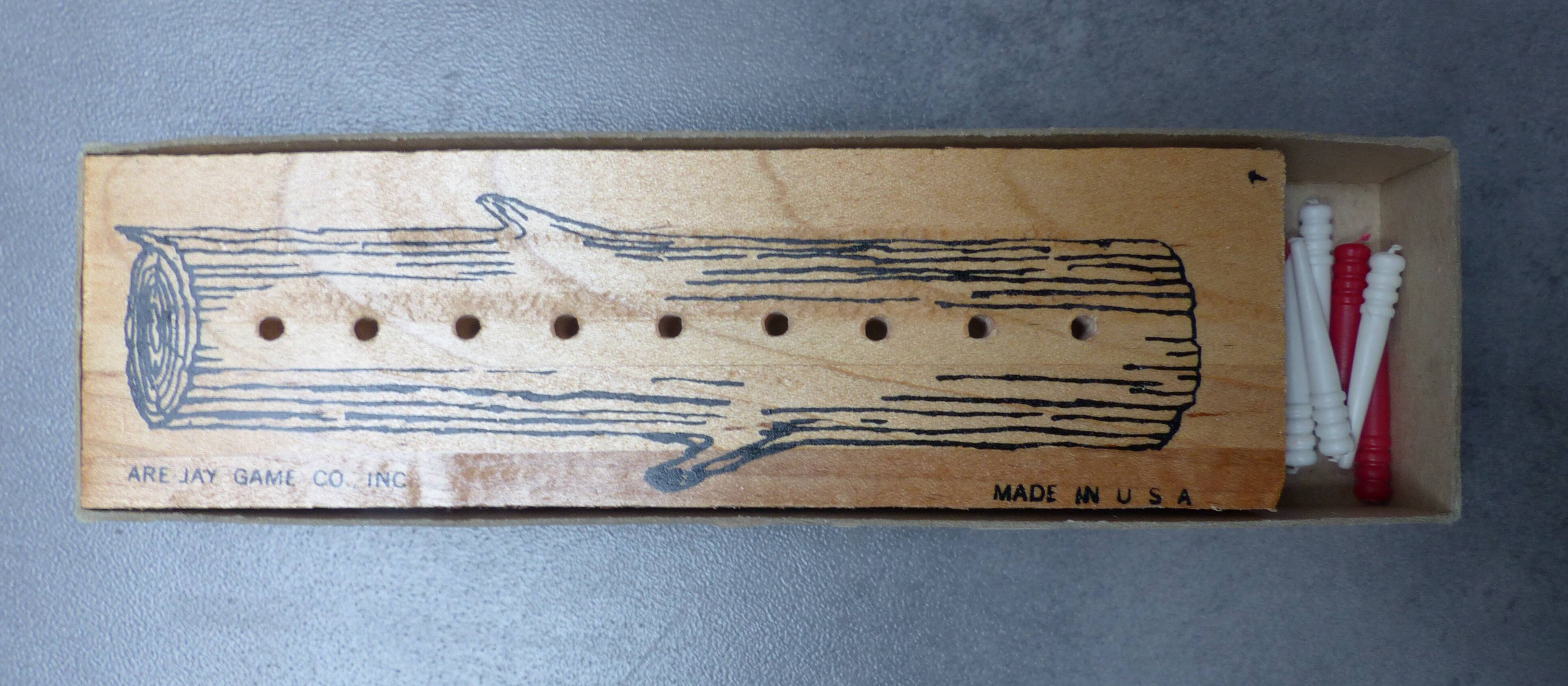 Wooden game "8 men in a log"