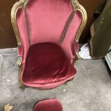 Fauteuil en bois doré et repose pieds