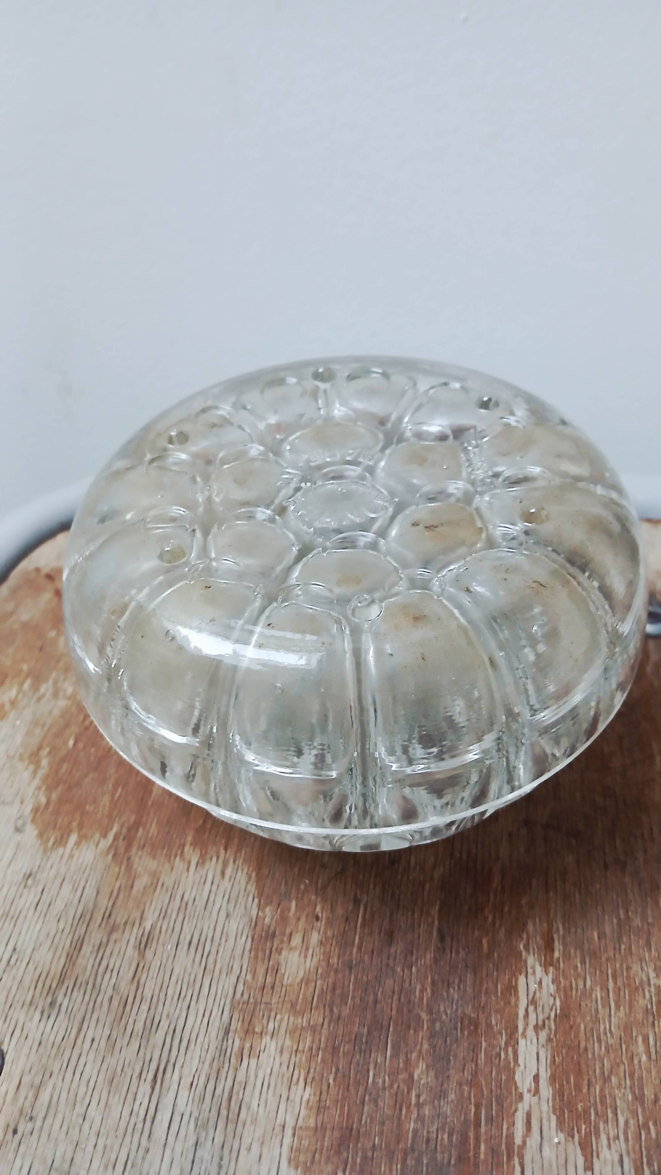 Glass flower arrangement from REIMS on a silver-plated metal stand.