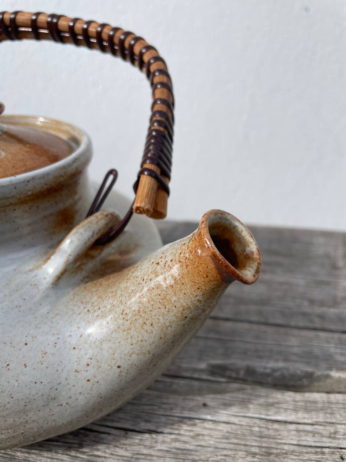 Grand Feu ceramic stoneware and rattan teapot