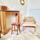 Wooden stool and red formica